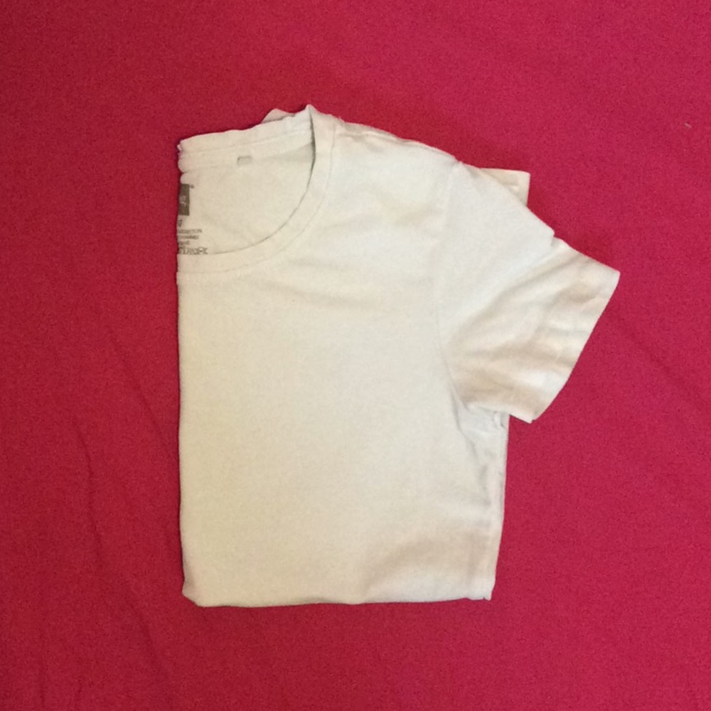 White t-shirt. Tag